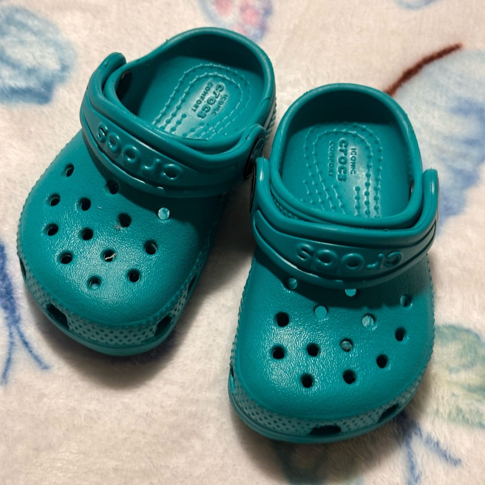 EUC teal baby crocs clogs